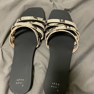 Black animal print sandals